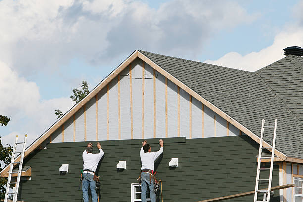 Professional Siding Installation technician working in Durham, OR